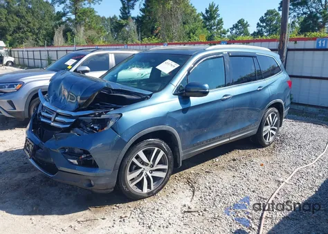 2018 Honda Pilot Touring z USA, uszkodzony, nr VIN 5FNYF5H92JB015751